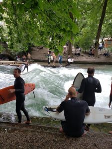 Surfers in Munich English Gardens